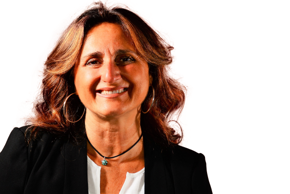 Life Coach in Victoria B, Simona, wearing a navy blue blazer with a white collared shirt for business